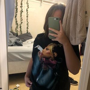 A concert t-shirt of dua lipa